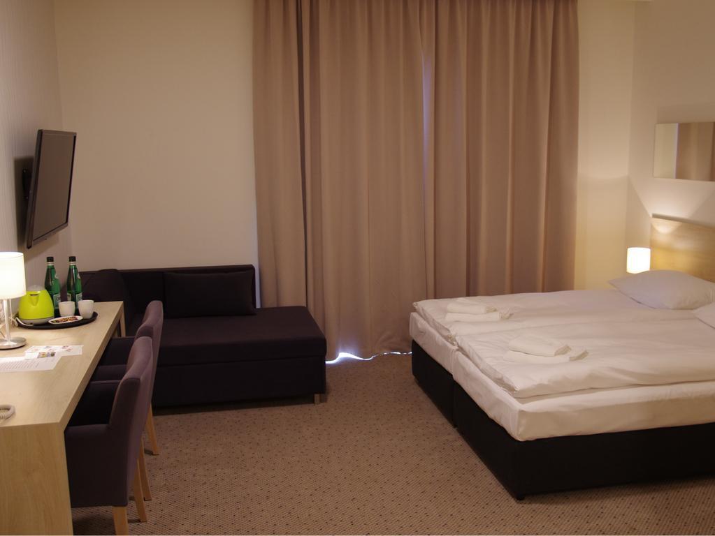 Hotel Uniejow Szoba fotó